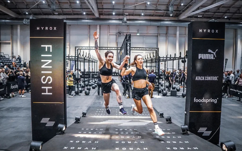 Hyrox athletes crossing finish line